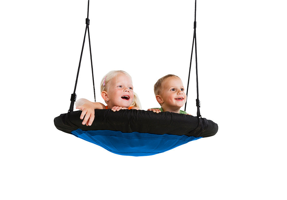 Action shot of kids swinging on Nest Swing from Gorilla Playsets