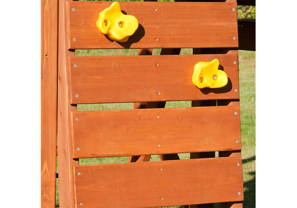 Lifestyle shot of Yellow Climbing Rock Holds from Gorilla Playsets.