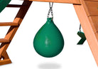 Green punching ball attached to underside of swing set deck on white background.