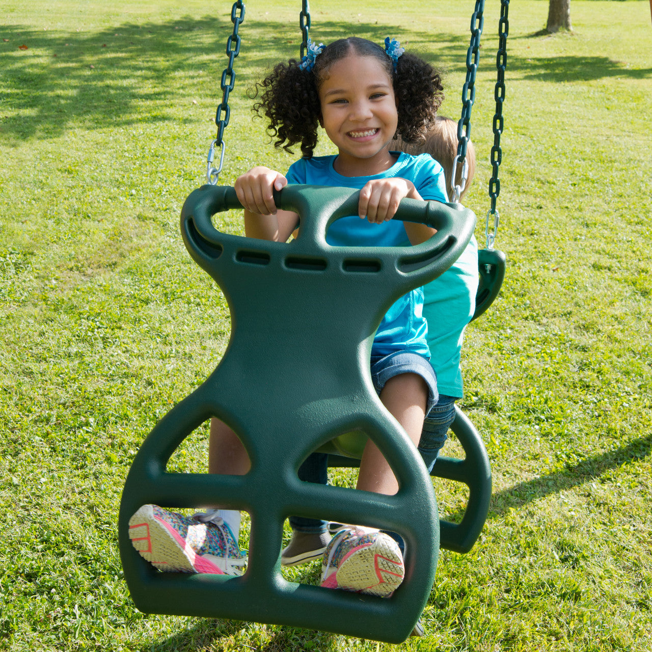 Outdoor shot of Double Glider Swing Swing from PlayNation.